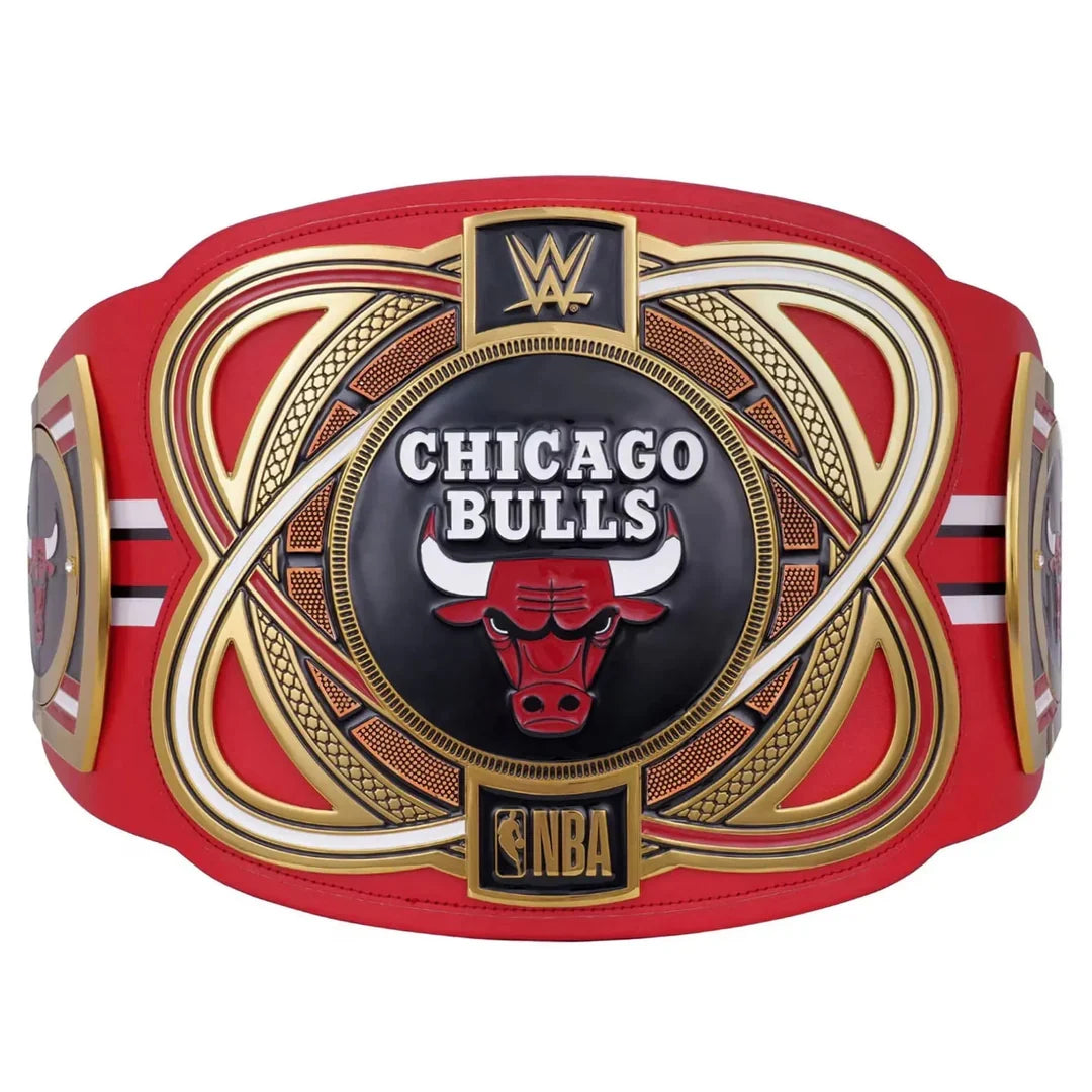 A red and gold Chicago Bulls WWE NBA championship belt with a large central plaque featuring the team logo and WWE and NBA branding.