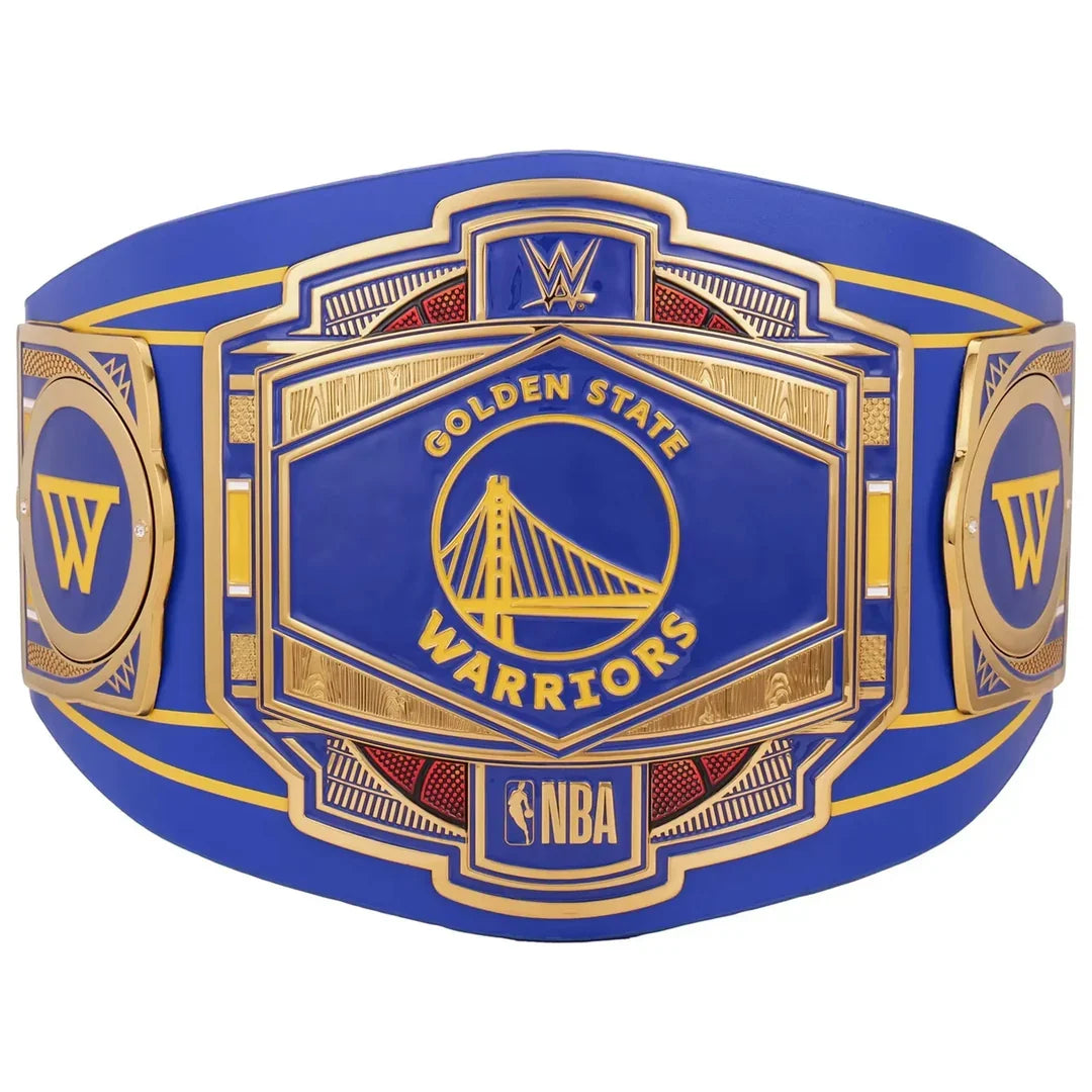 A replica Golden State Warriors championship belt featuring a royal blue strap with gold-plated metal plates, the Golden State Warriors logo, WWE branding, and an NBA logo, shown against a plain white background.
